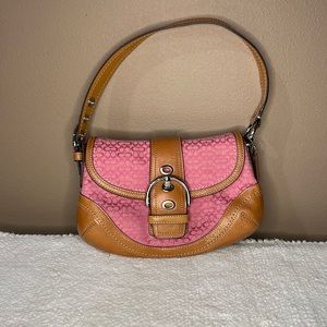 New with out tag. Small clutch, never used !